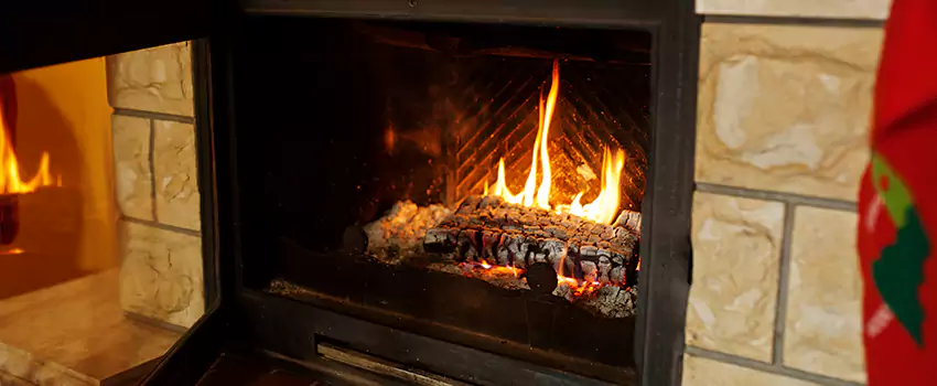 Commercial Prefabricated Fireplace Replacement in Chicoutimi, Quebec