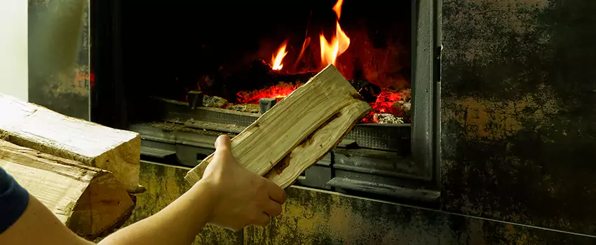 Wood Stove Heat Resistant Wall Repair in Chicoutimi, Quebec